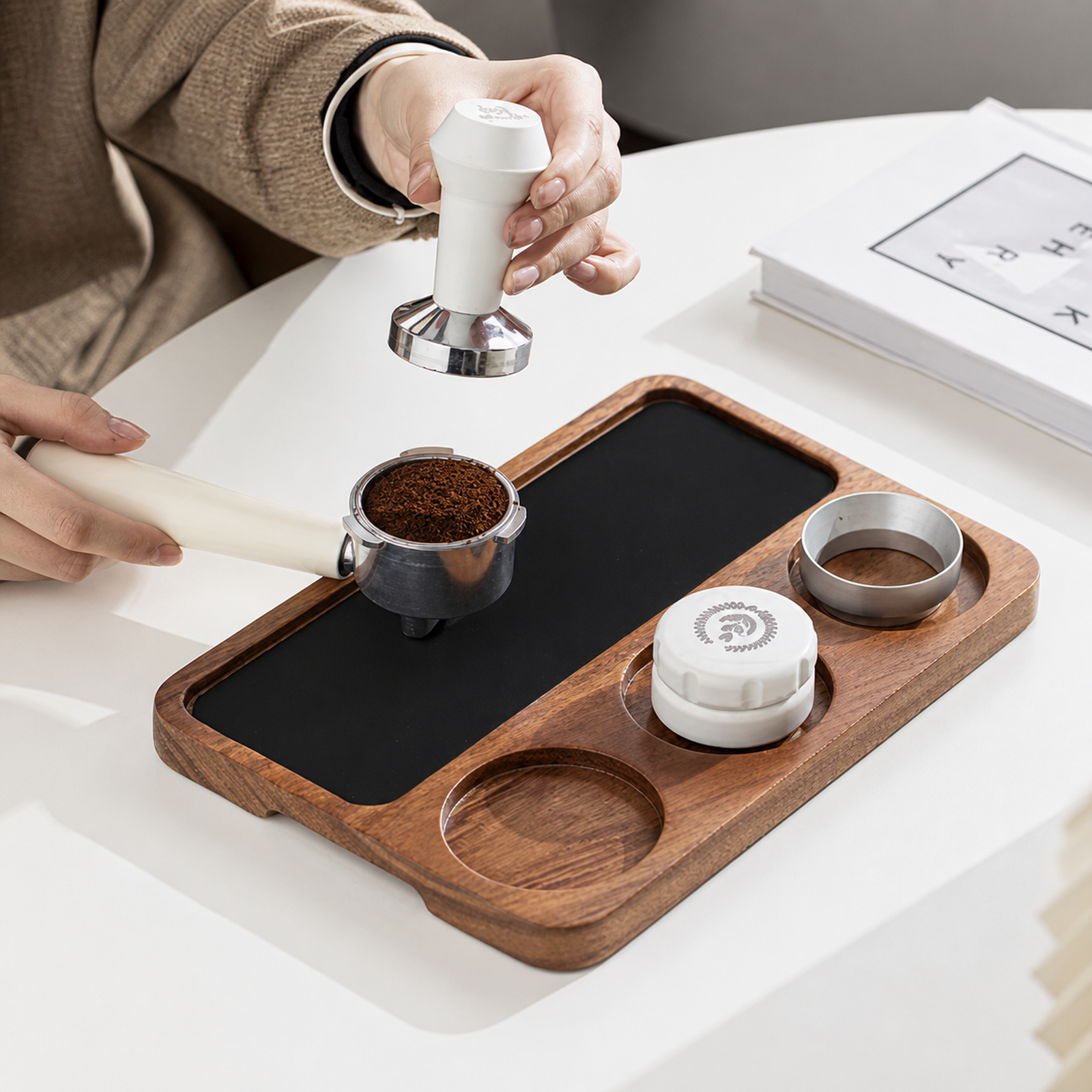 Solid walnut espresso tamping work board used with a portafilter and tamper
