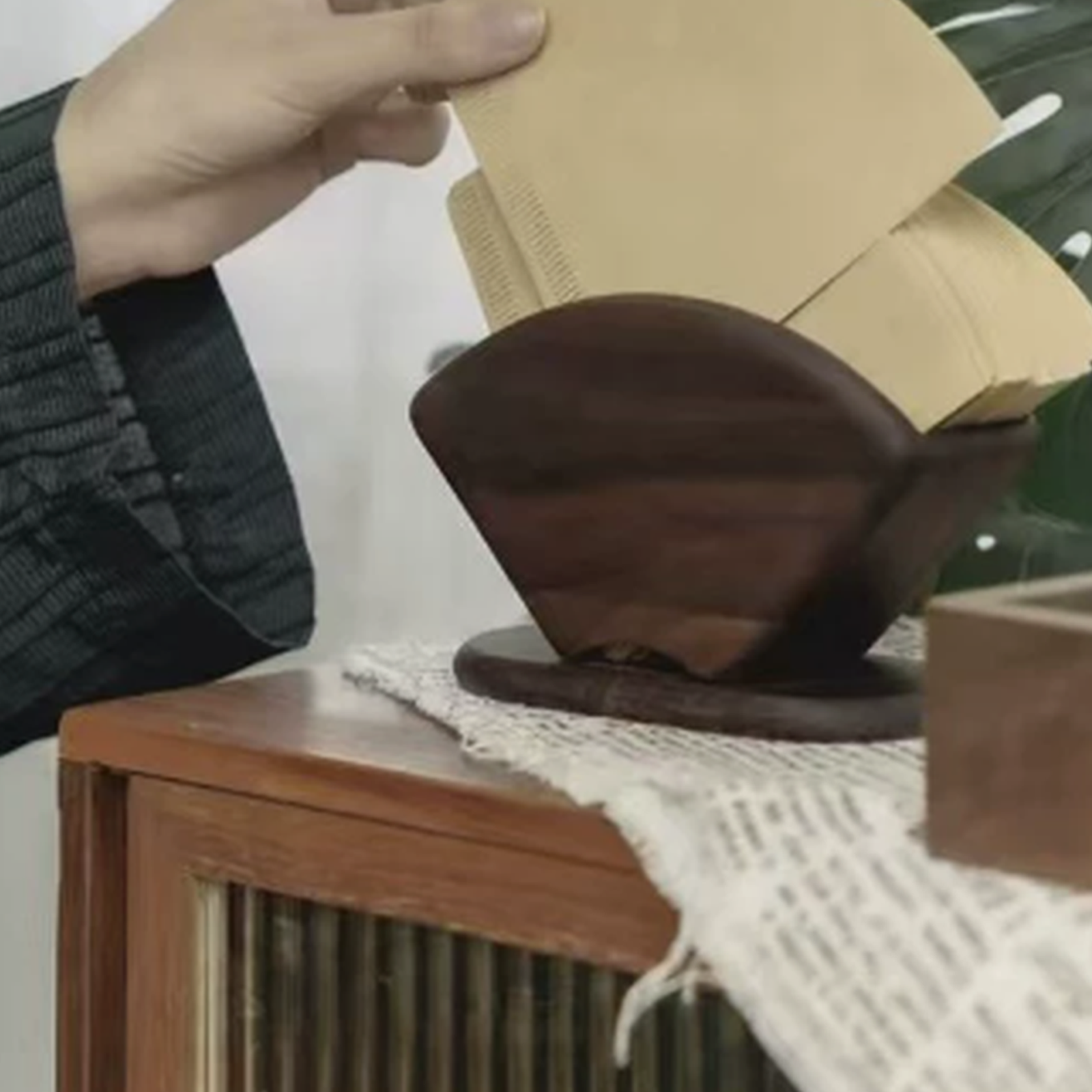 Walnut filter paper organizer on a coffee bar