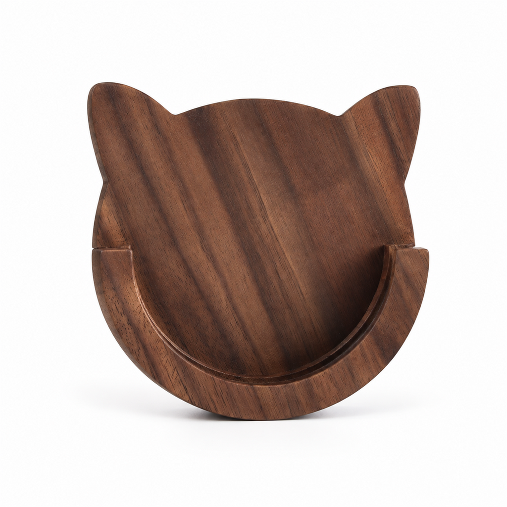 Solid walnut cat-shaped magnetic portafilter holder on a white background