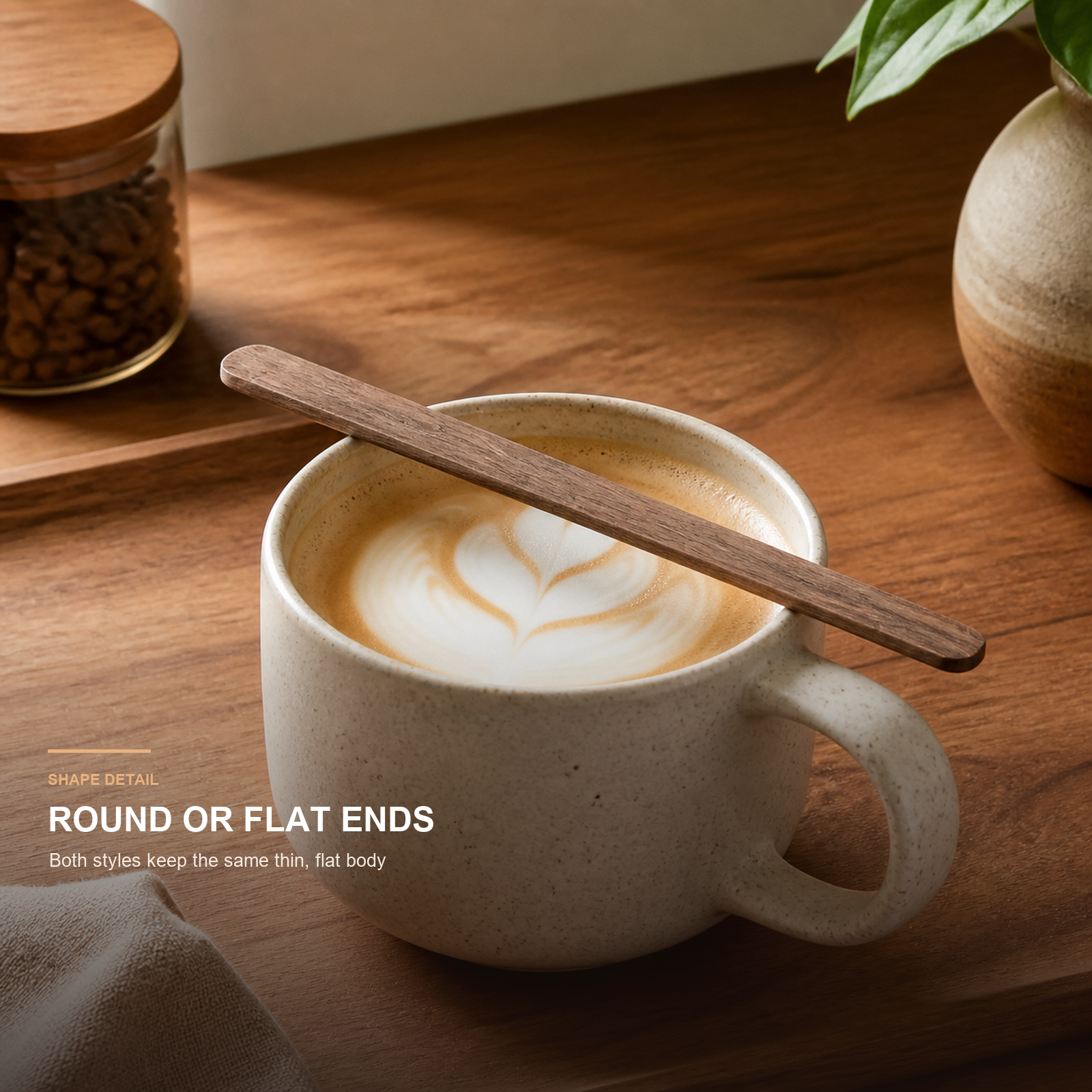 Round and straight end shape detail on flat walnut stirrers