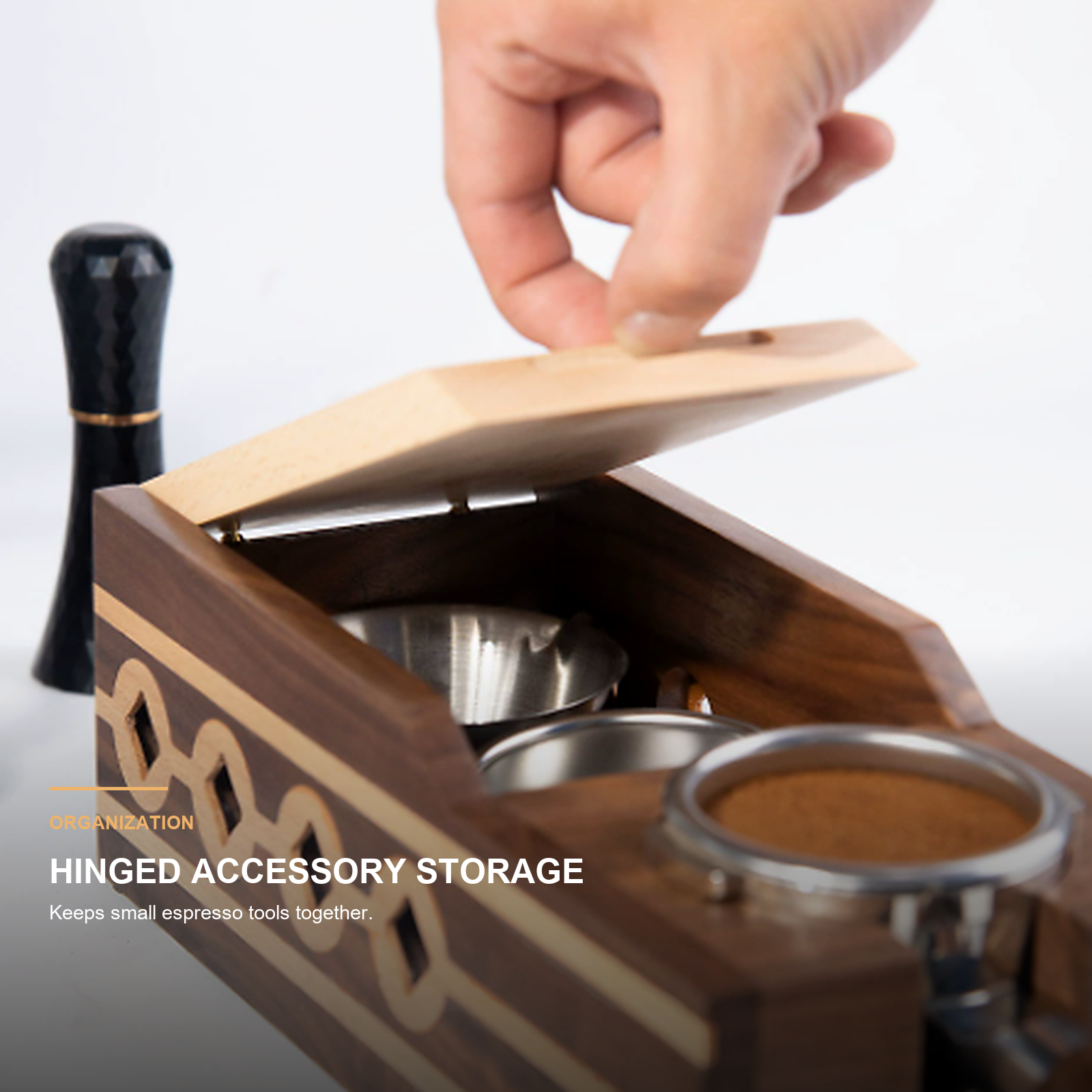 Close-up of hinged accessory storage in solid walnut espresso station