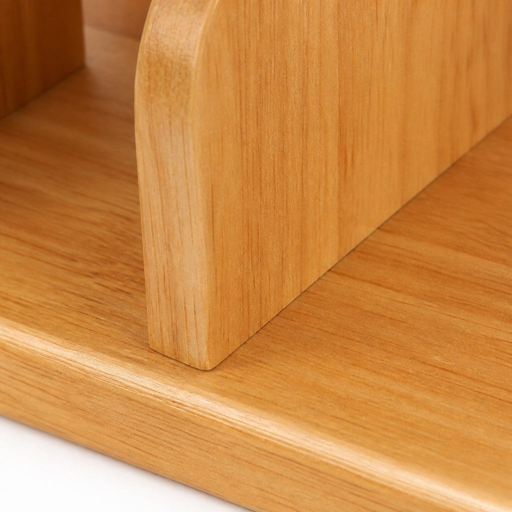 Rounded fixed divider joint and Cherry Wood board edge detail