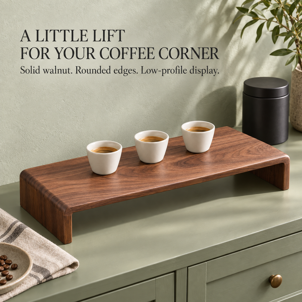 Solid walnut coffee shelf in an espresso tasting scene highlighting rounded edges and a low-profile design