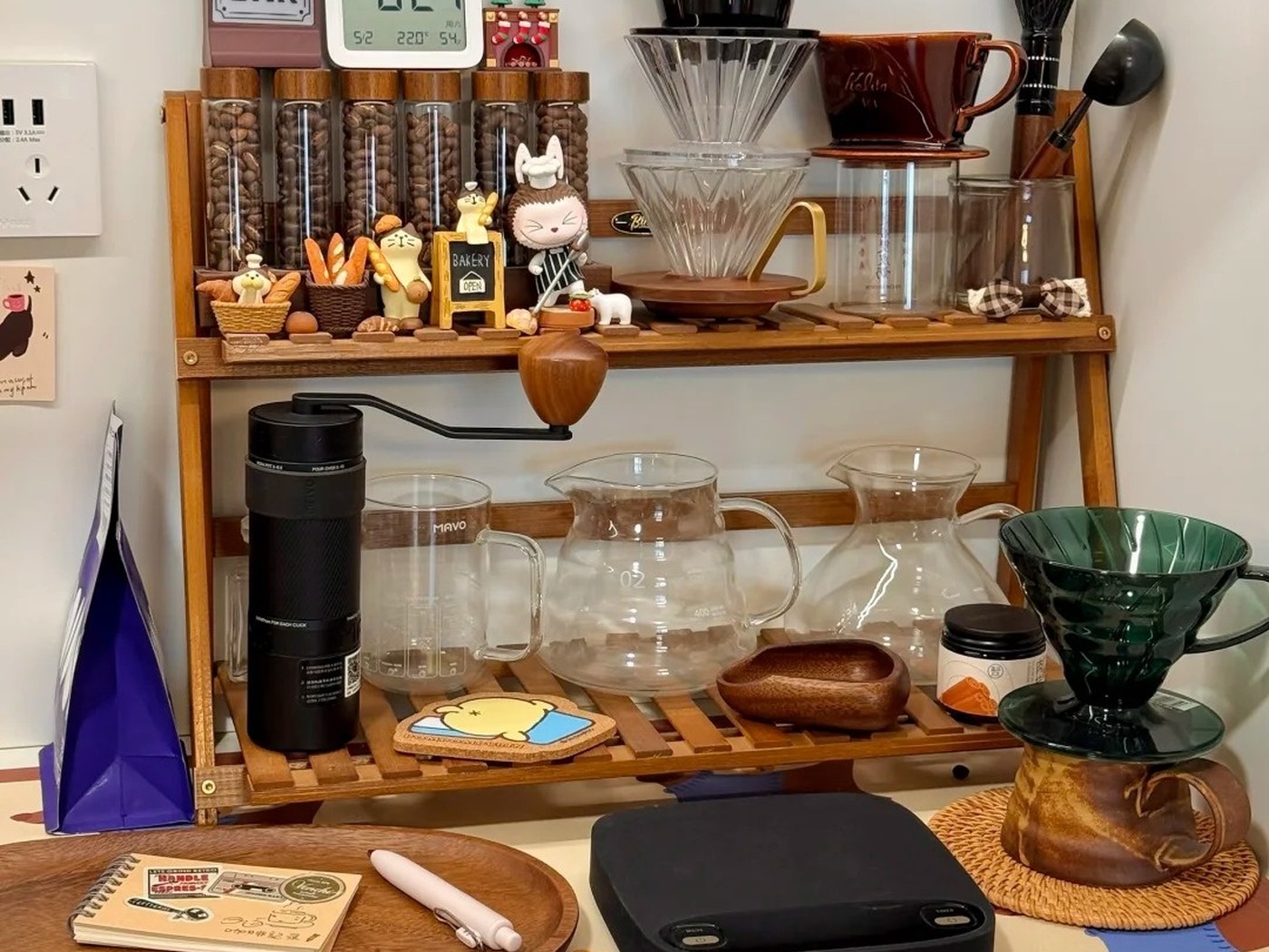 Dining room coffee serving tray arranged with cups and pastries away from the espresso machine