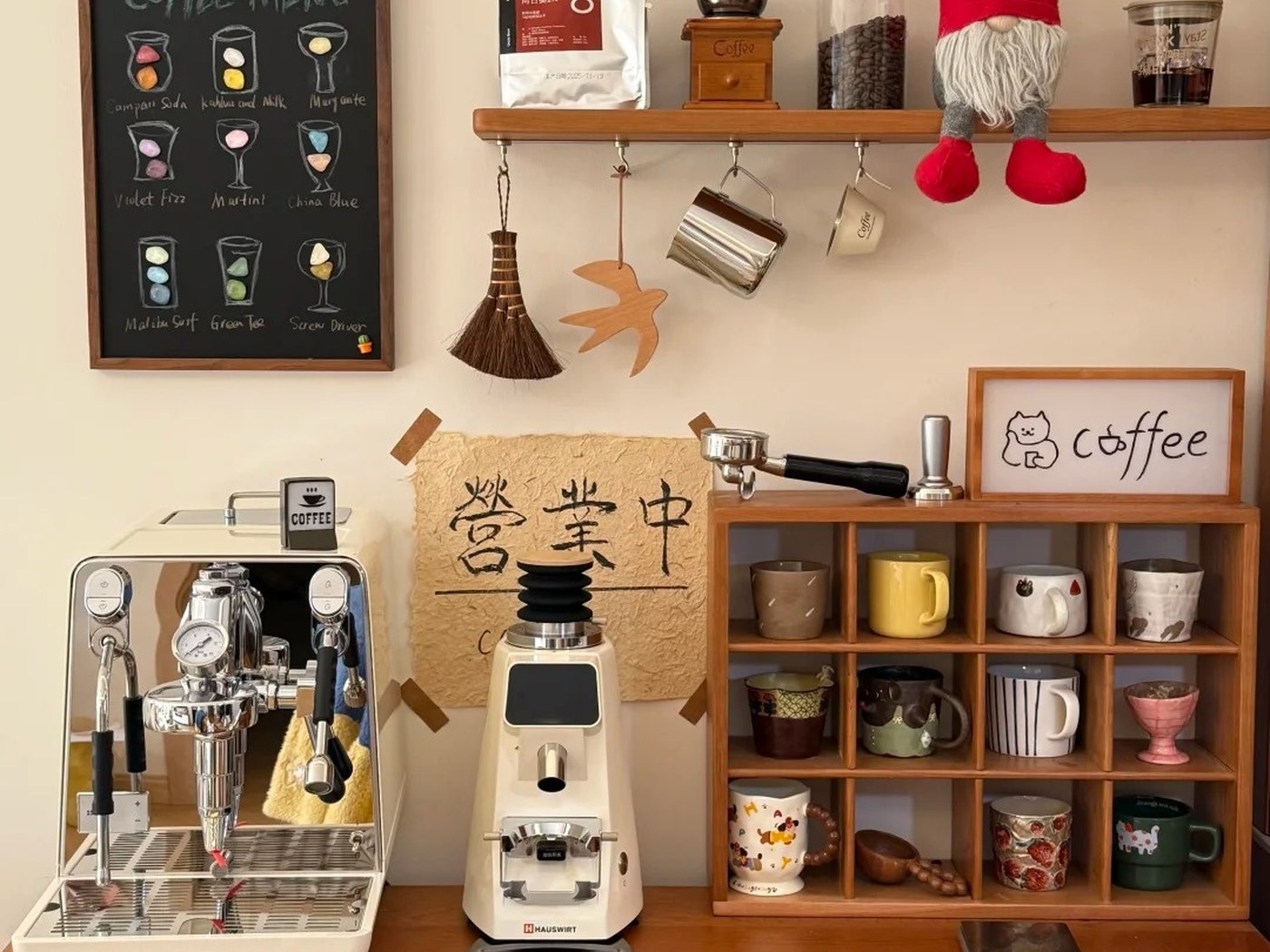 Compact one-wall coffee station using a shallow wood cabinet, mug cubbies and a shelf