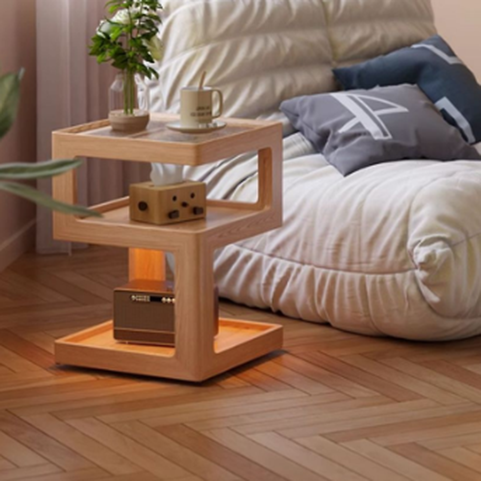 Natural finish three-tier coffee side table beside a lounge chair