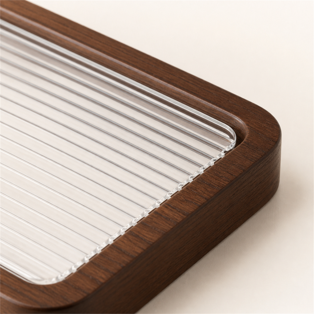 Close-up of 4 mm ribbed acrylic insert fitted into rounded rubberwood rail