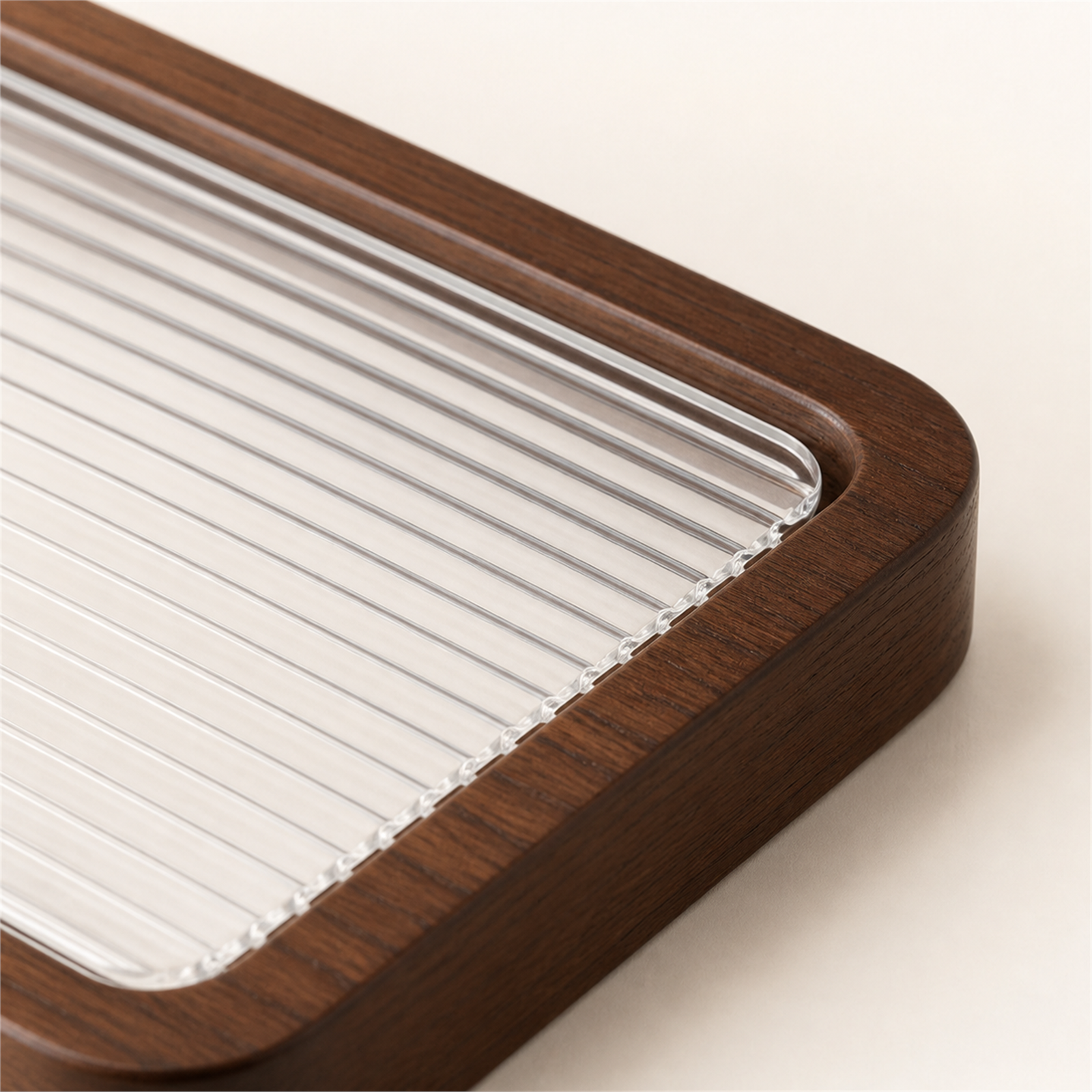 Close-up of 4 mm ribbed acrylic insert fitted into rounded rubberwood rail