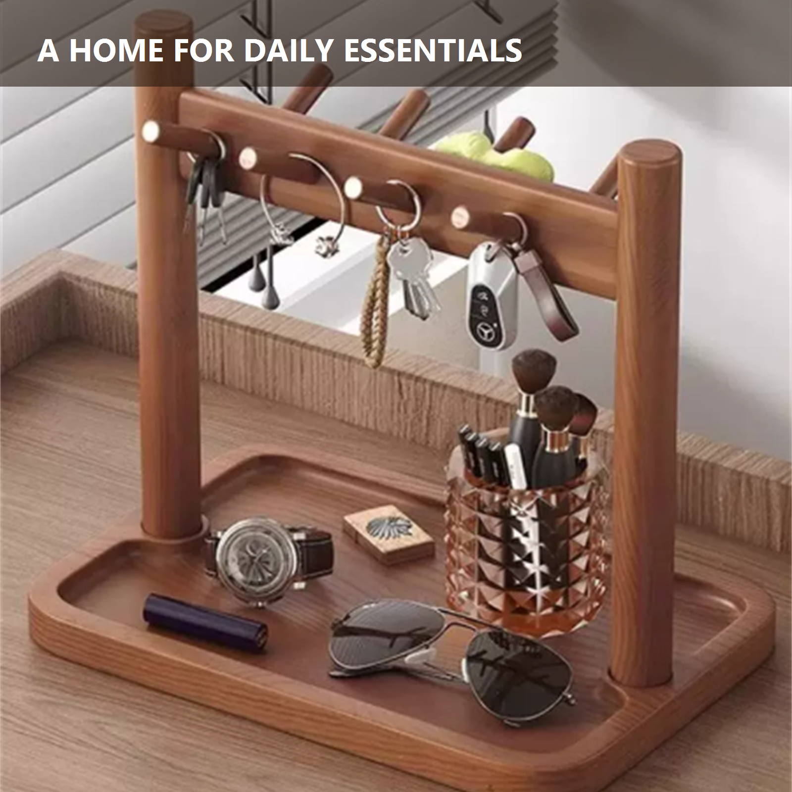 Rubberwood countertop organizer holding keys and small accessories by a window