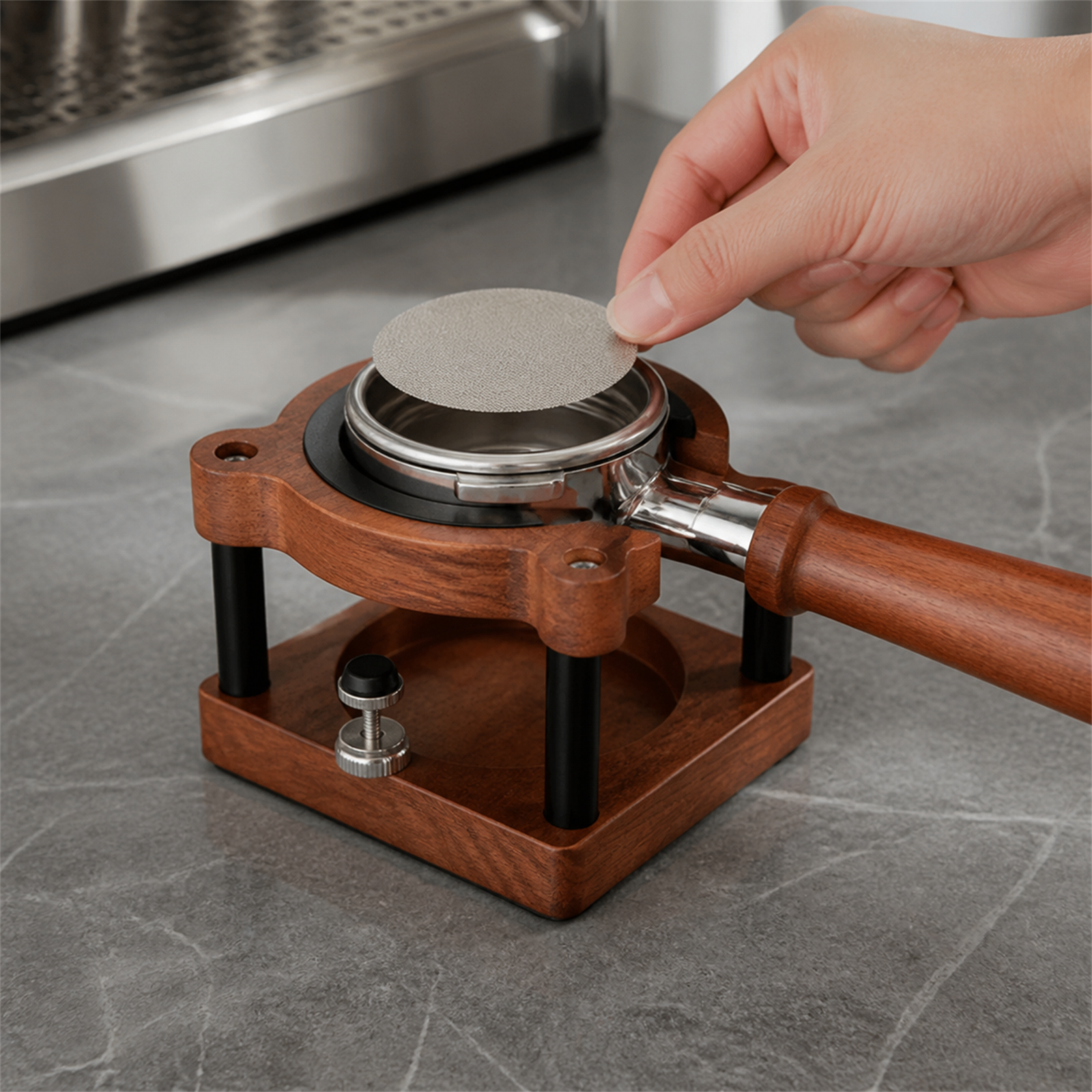 Small sapele portafilter support holding a basket during puck screen placement