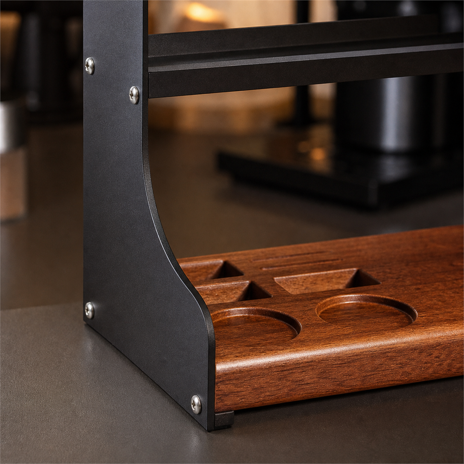 Close-up of solid walnut tray and black steel frame construction