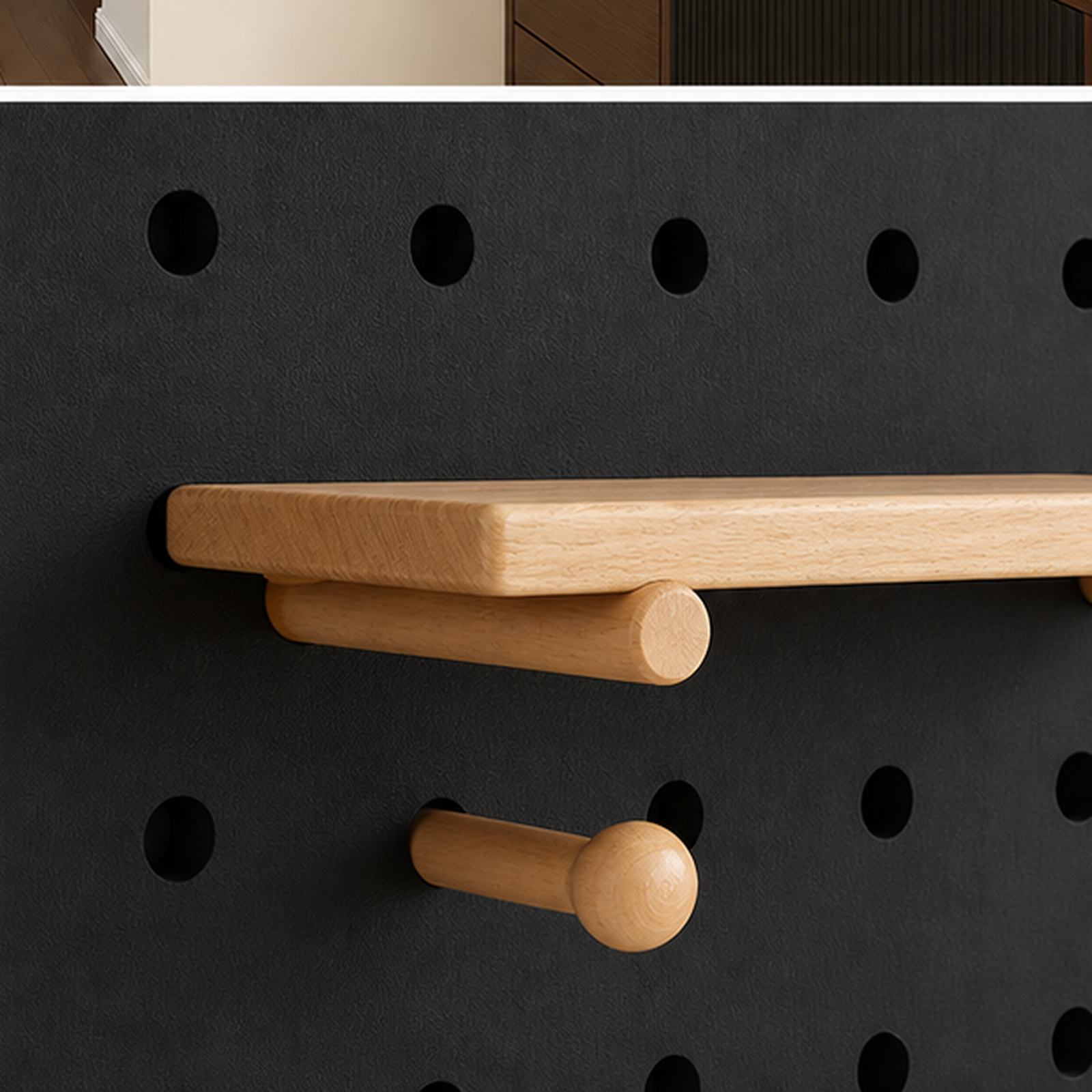 Textured Black pegboard round-hole grid, shelf mounting and wooden peg detail